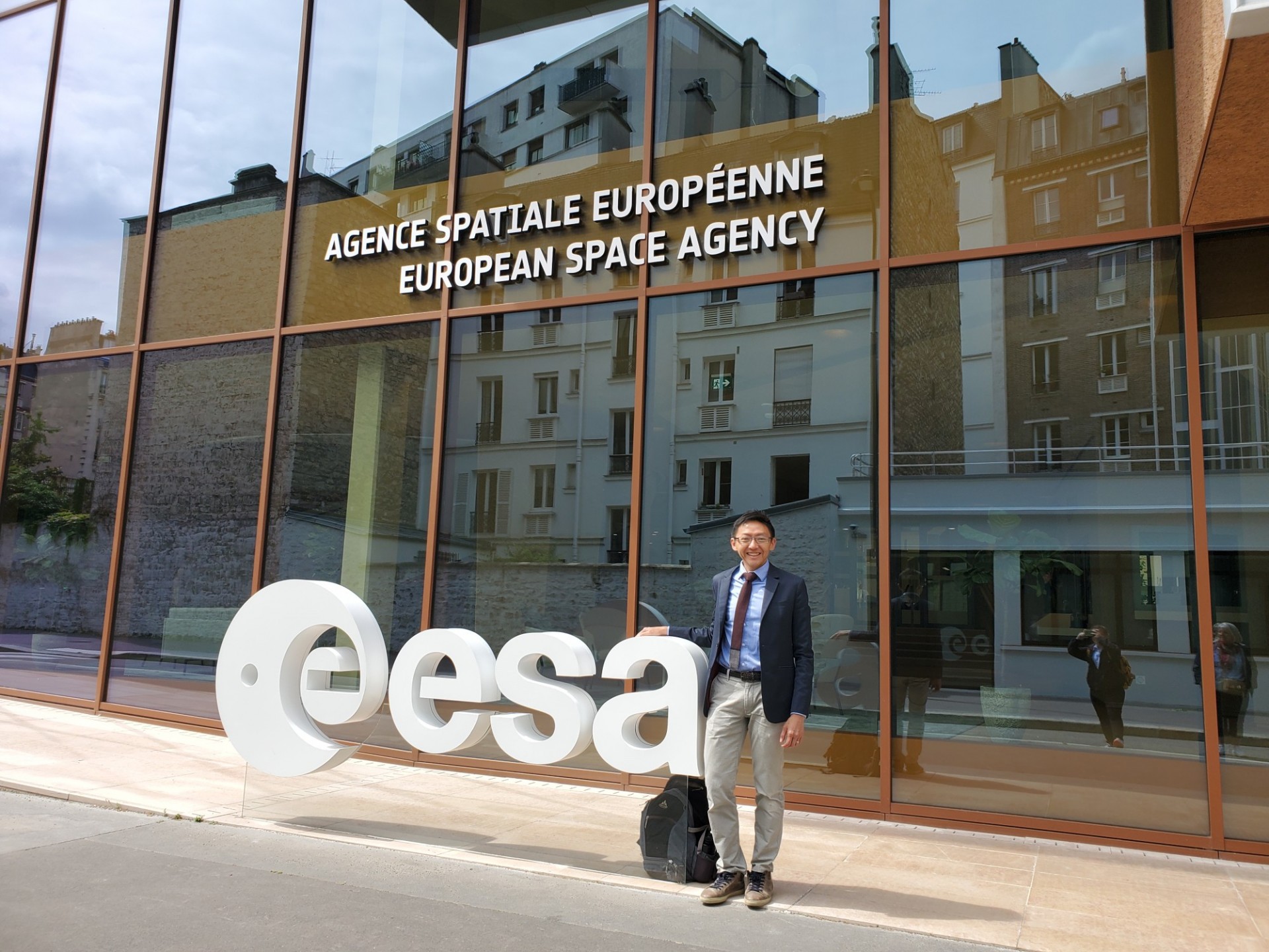 Yip at the European Space Agency headquarters building